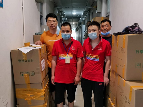10 羅江、陸超兩位老師完成打包.jpg